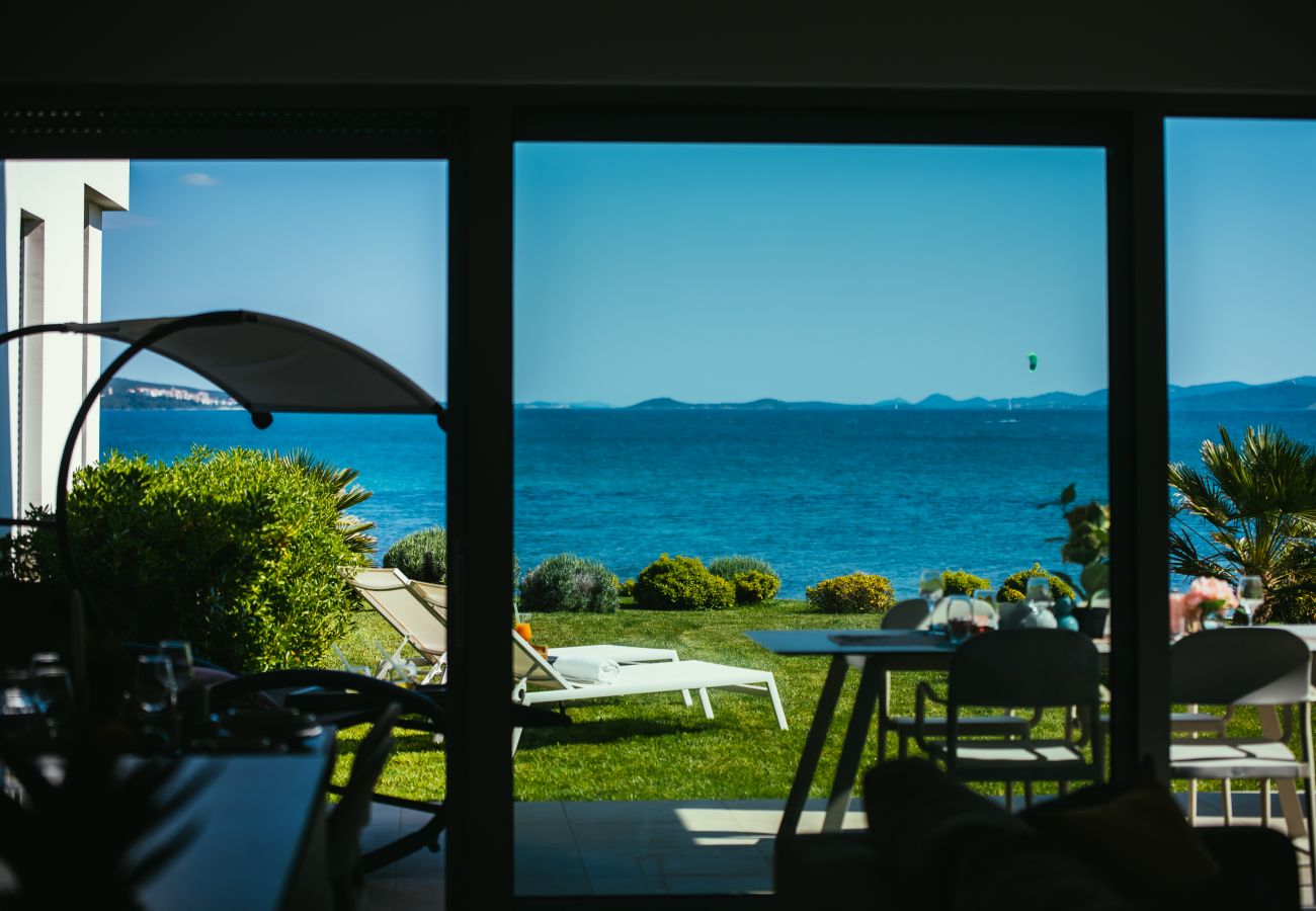 Ferienwohnung in Sukošan - Beachfront Luxe Designer Apartment