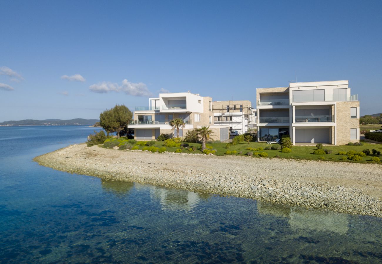 Ferienwohnung in Sukošan - Beachfront Luxe Designer Apartment
