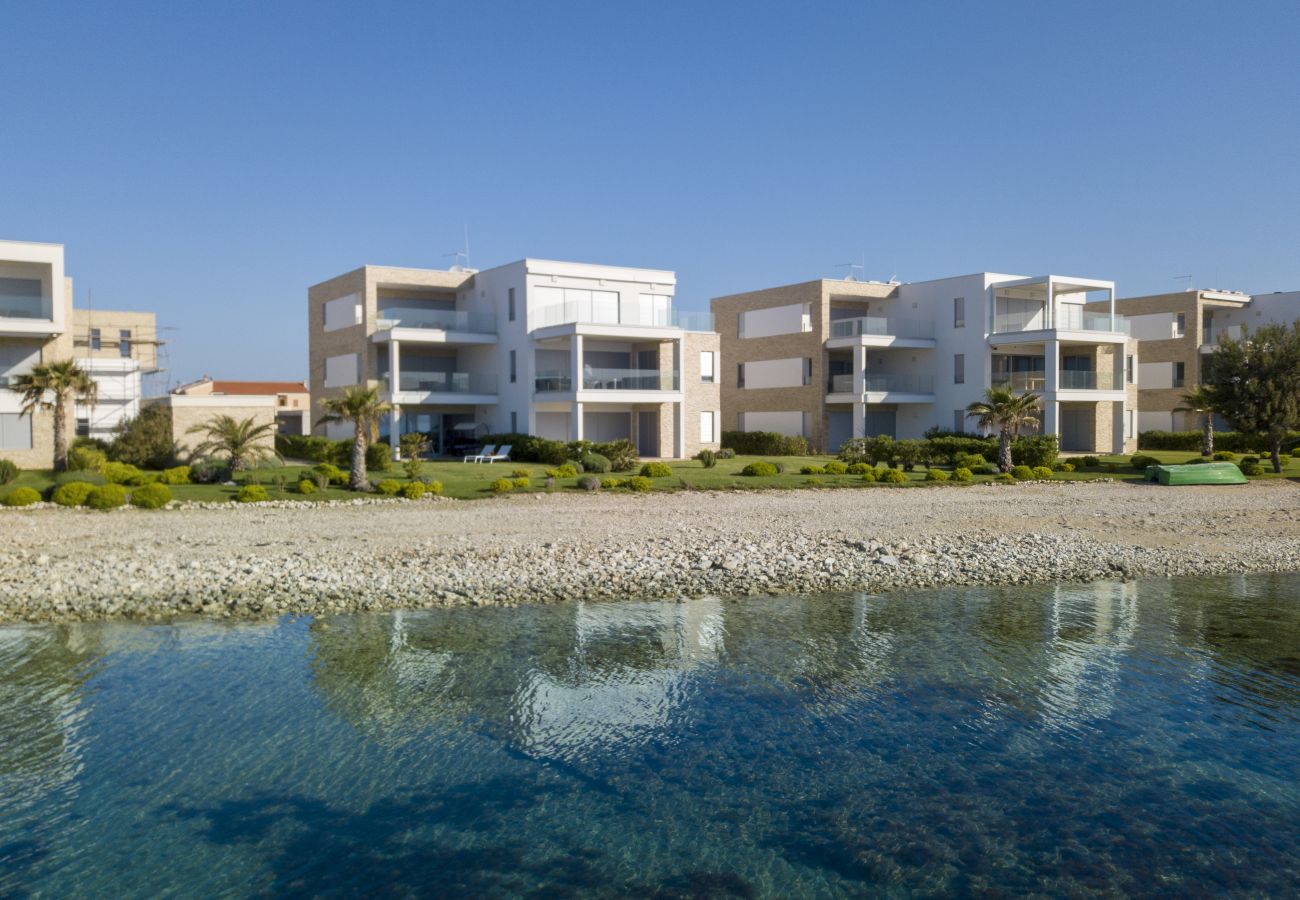 Ferienwohnung in Sukošan - Beachfront Luxe Designer Apartment