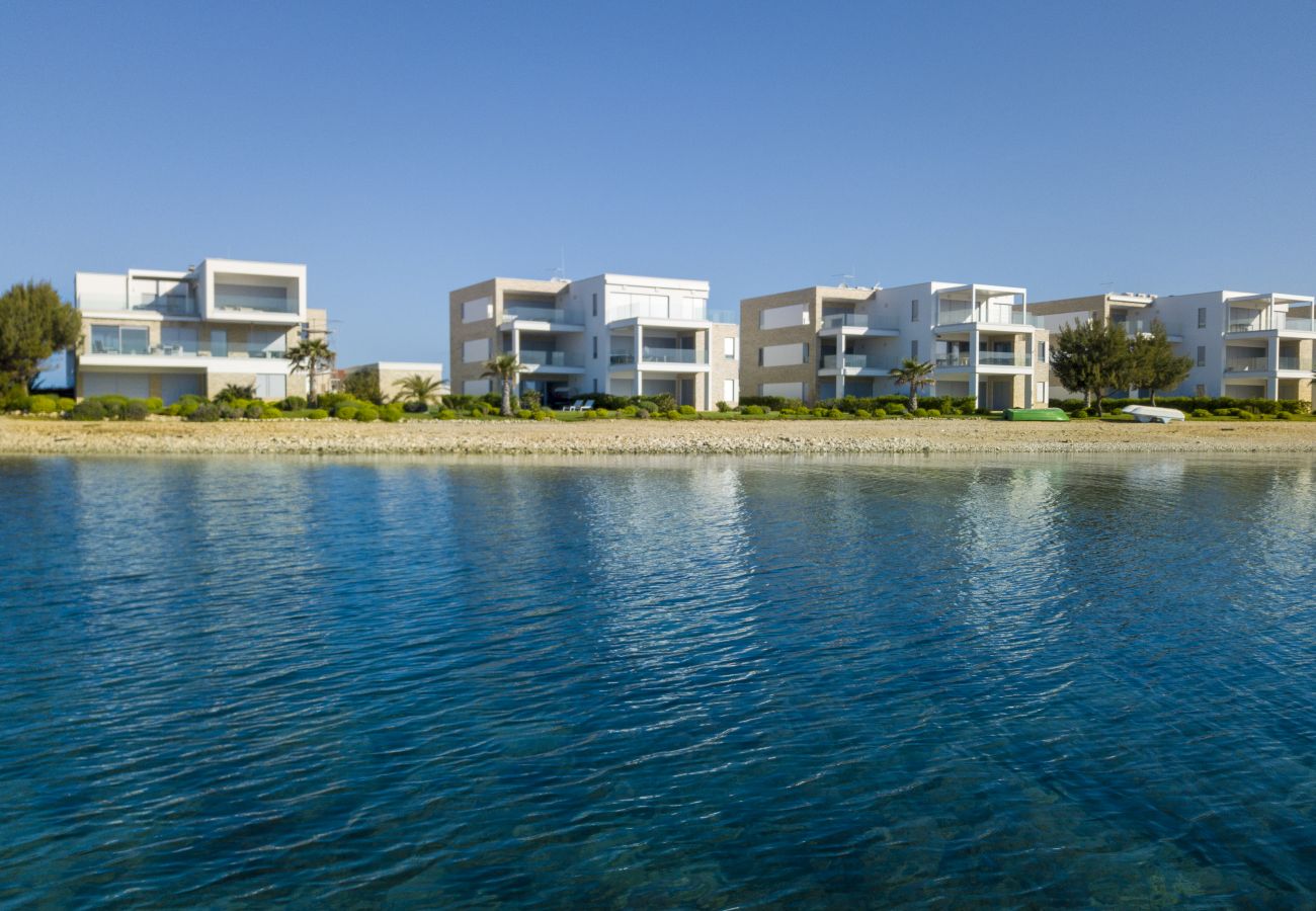 Ferienwohnung in Sukošan - Beachfront Luxe Designer Apartment