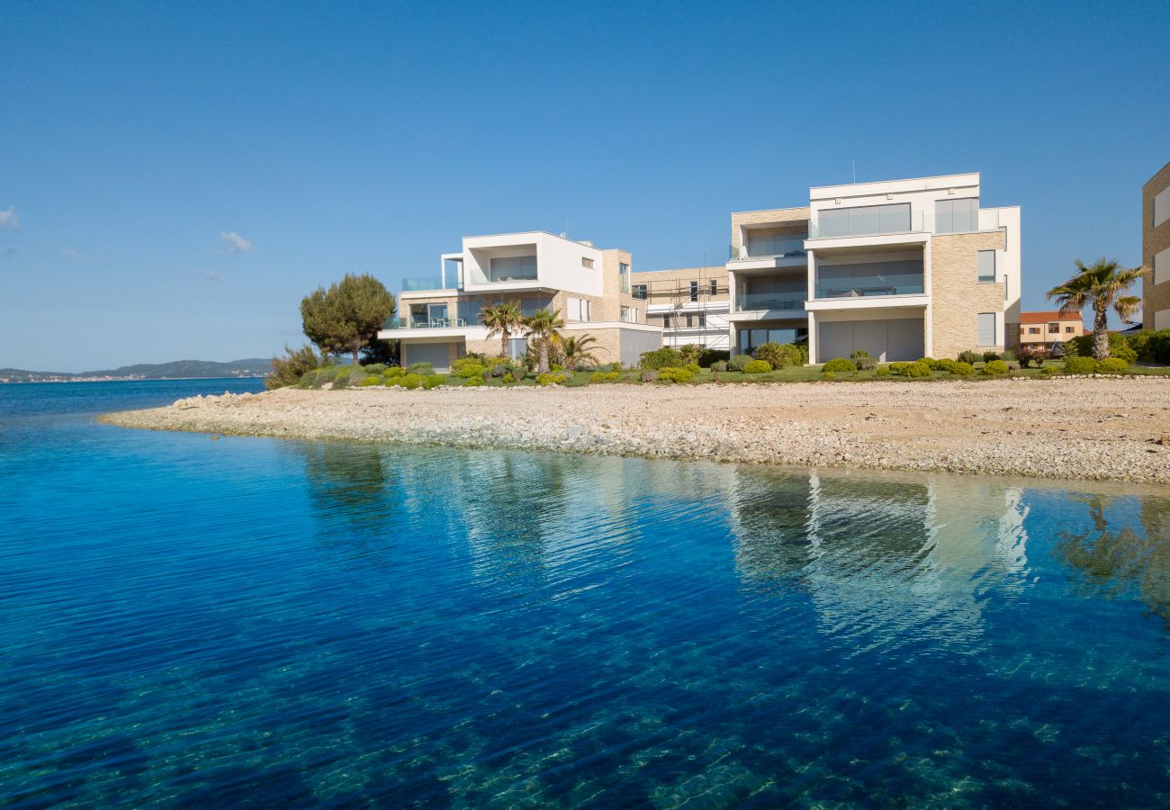 Ferienwohnung in Sukošan - Beachfront Luxe Designer Apartment