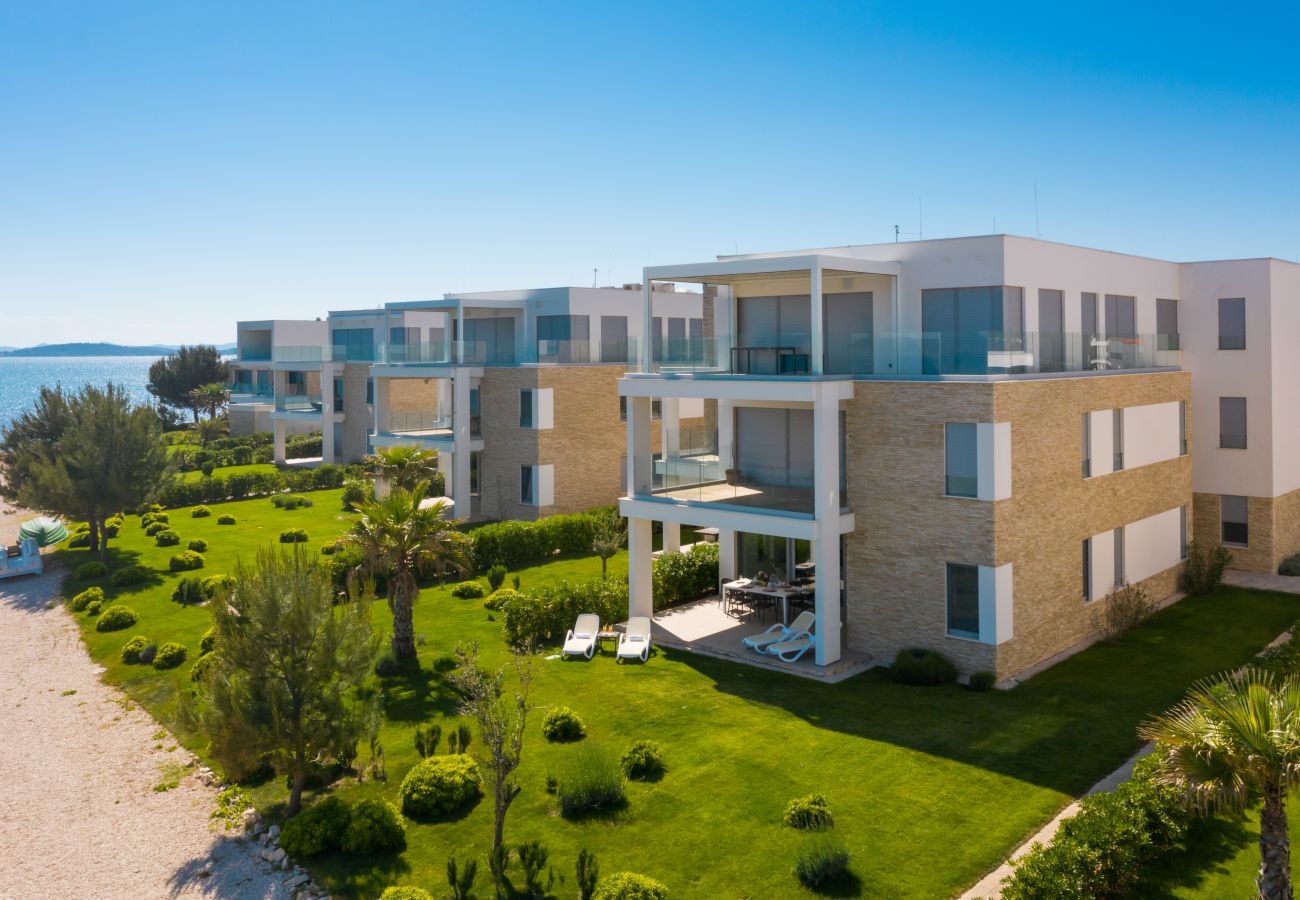 Ferienwohnung in Sukošan - Beachfront Luxe Designer Apartment