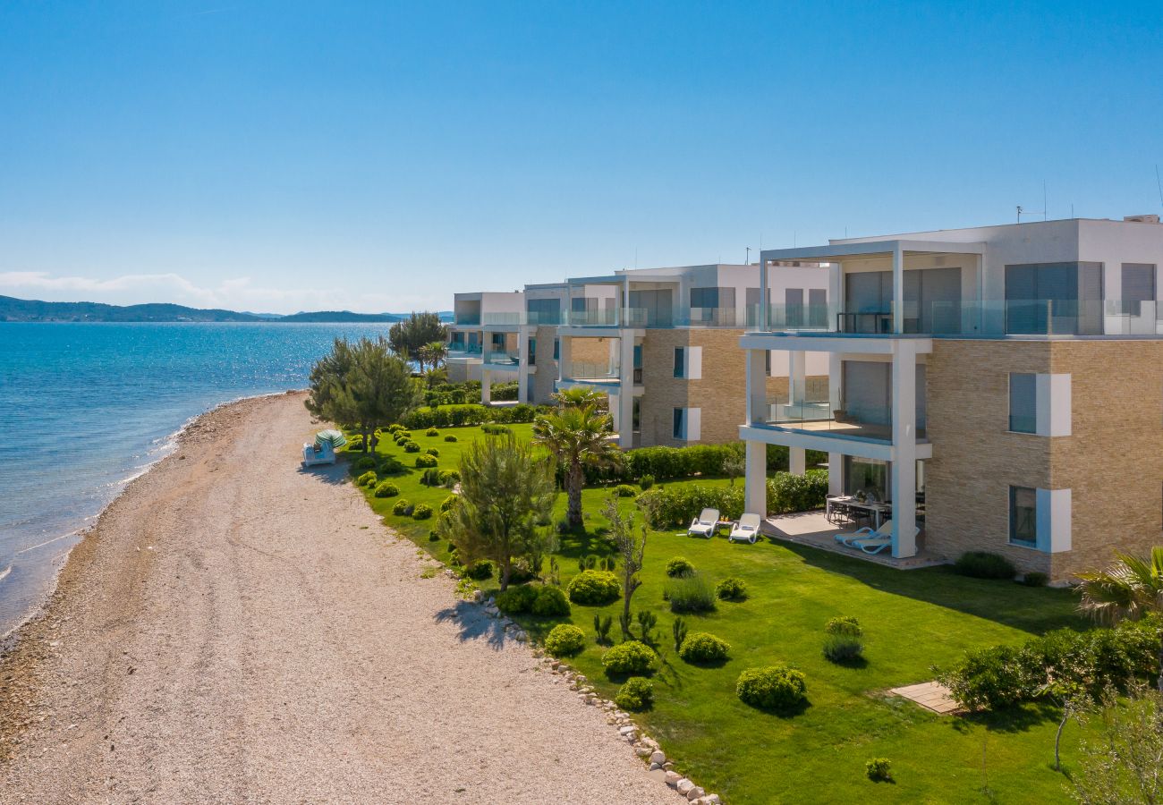 Ferienwohnung in Sukošan - Beachfront Luxe Designer Apartment