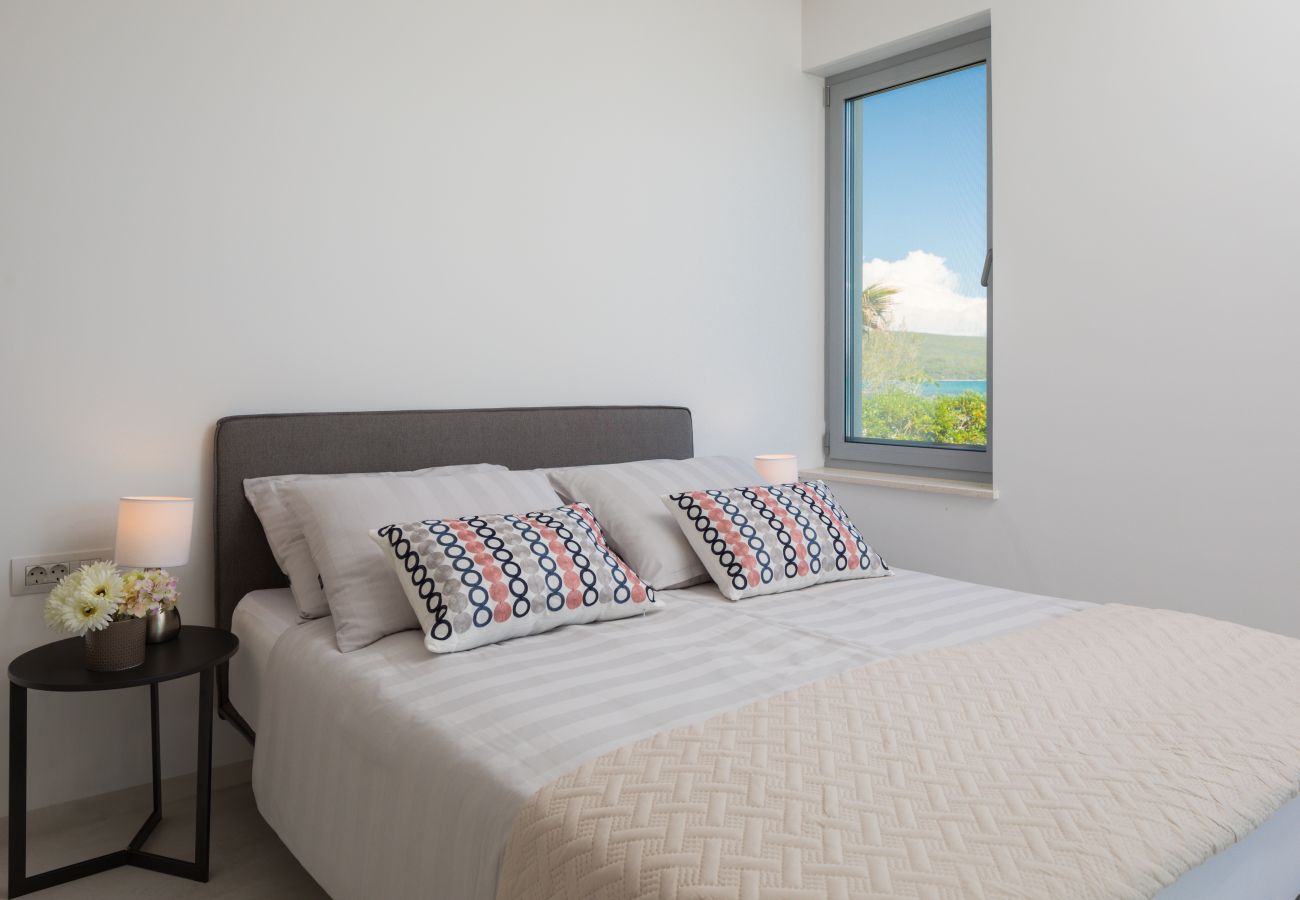 Ferienwohnung in Sukošan - Beachfront Luxe Designer Apartment