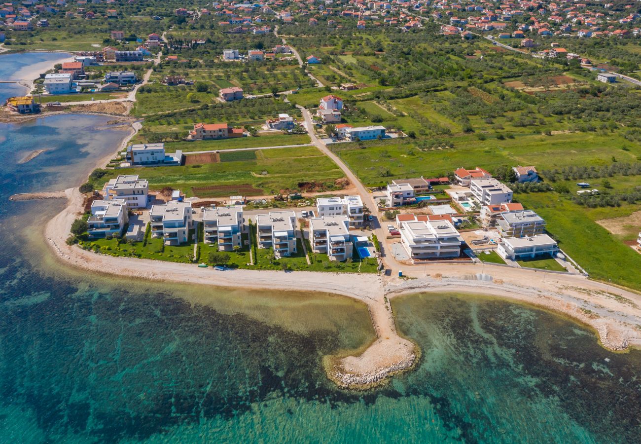 Ferienwohnung in Sukošan - Beachfront Luxe Designer Apartment